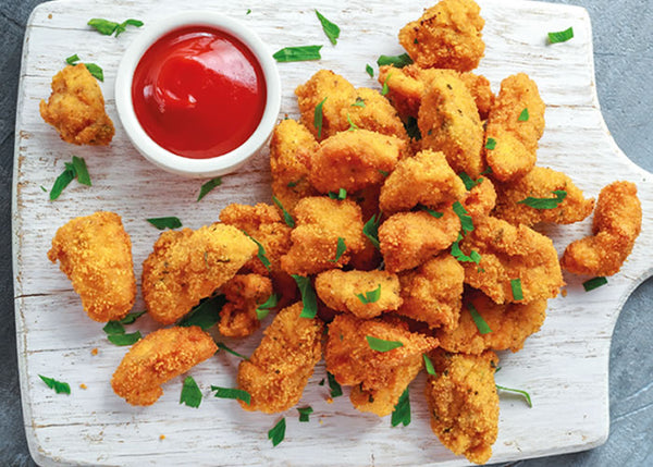 https://getzippi.com/cdn/shop/files/chicken-nuggets_600x.jpg?v=1671128636